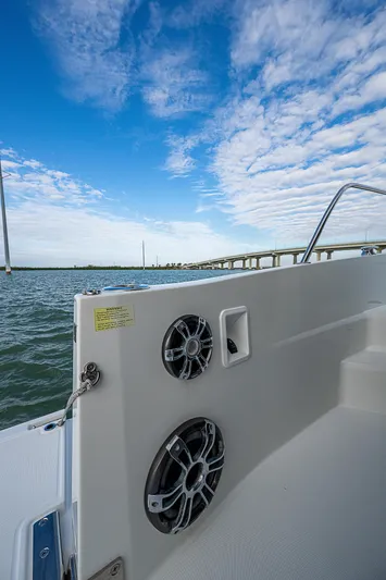 Brama Sole Yacht Photos Pics 2022 Jeanneau Leader 12.5 boat on water, showcasing speakers and clear sky.