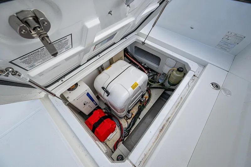Brama Sole Yacht Photos Pics Engine compartment of 2022 Jeanneau Leader 12.5 boat, showcasing mechanical components.