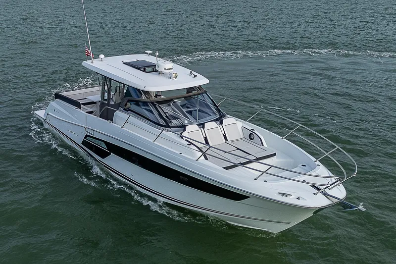 Brama Sole Yacht Photos Pics 2022 Jeanneau Leader 12.5 cruising on open water, showcasing sleek design and modern features.