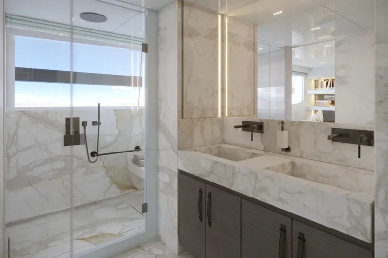  Yacht Photos Pics Luxurious marble bathroom in 2026 Sanlorenzo SL120A yacht, featuring dual sinks and glass shower.