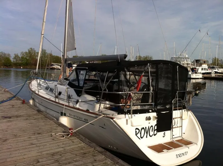 Royce Yacht Photos Pics Sailboat Beneteau 423, 2007 model, docked at marina with clear skies.