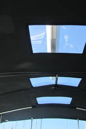 Royce Yacht Photos Pics Interior view of 2007 Beneteau 423 sailboat with skylights and mast visible.