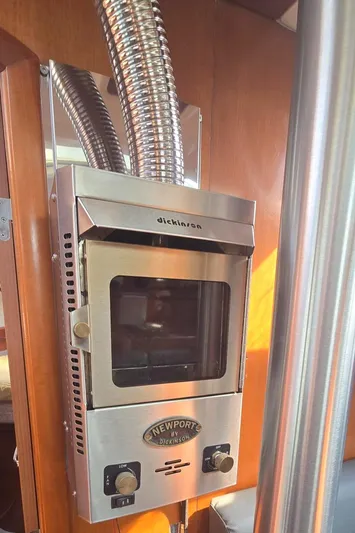 Royce Yacht Photos Pics Stainless steel marine heater in a 2007 Beneteau 423 sailboat interior.