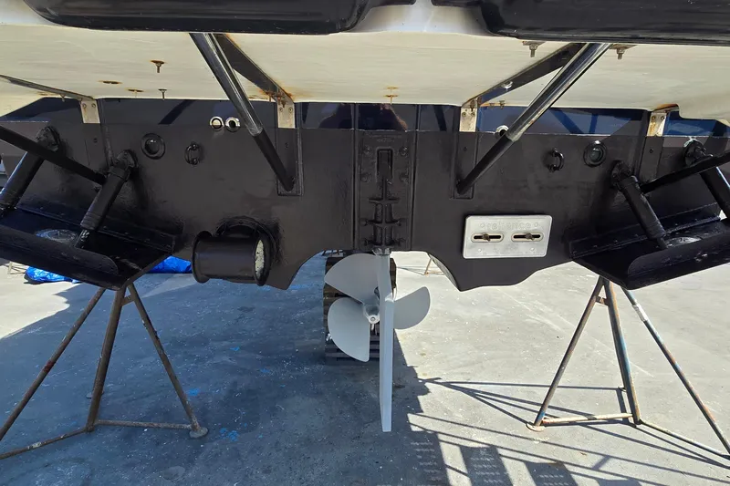 Triton Yacht Photos Pics 2011 Ranger Tugs R-29 boat underside with propeller and support stands.