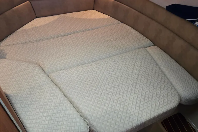 Triton Yacht Photos Pics 2011 Ranger Tugs R-29 interior bed with patterned upholstery.