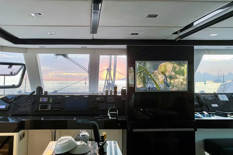 Deo Juvante Yacht Photos Pics Luxurious Sunreef 62 ARC yacht interior with modern navigation equipment, 2018 model, sunset view.