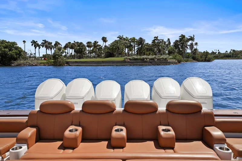Big Momma Yacht Photos Pics Luxury seating on 2023 HCB 65 Estrella boat with five powerful outboard engines.