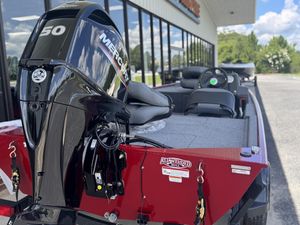 2025 Tracker Bass Tracker Classic XL with Mercury 50 engine, parked outside dealership.