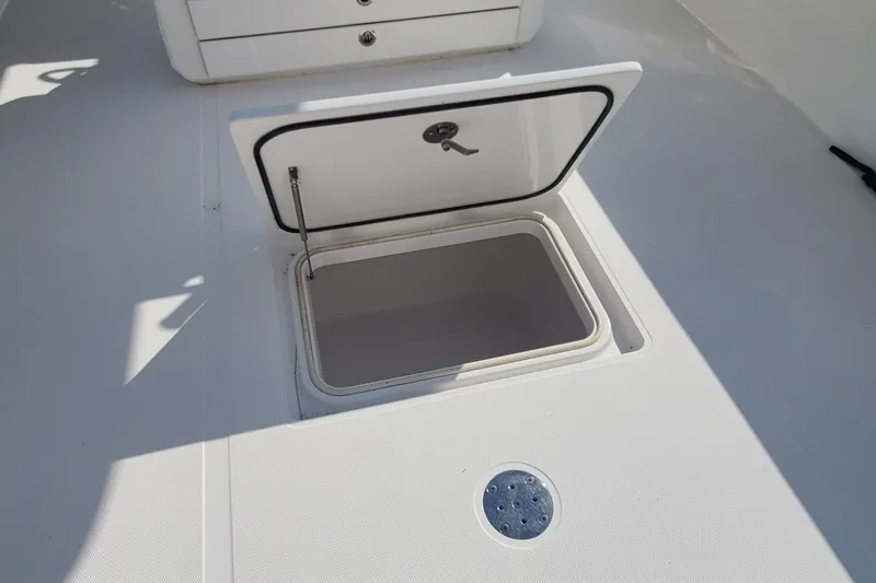 Dragonfly Yacht Photos Pics Open storage compartment on 2014 Bahama 41 FS boat deck.