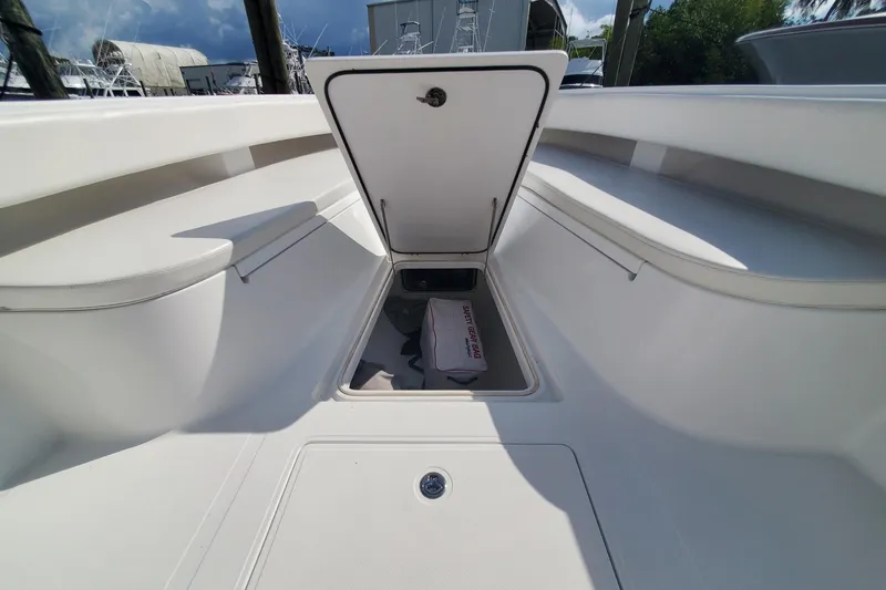 Dragonfly Yacht Photos Pics 2014 Bahama 41 FS boat interior storage compartment with open hatch, showcasing spacious design.