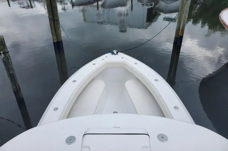 Dragonfly Yacht Photos Pics 2014 Bahama 41 FS boat docked in calm waters, viewed from above.
