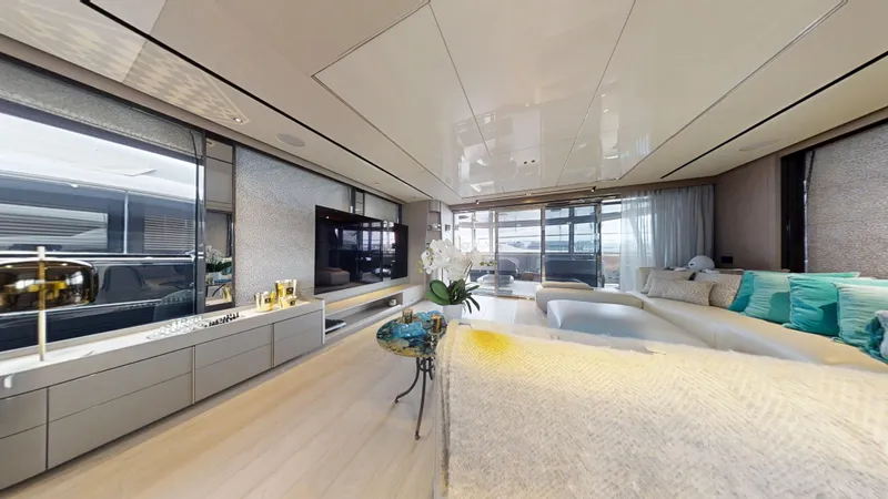 Majic Yacht Photos Pics Luxurious interior of 2023 Sunseeker 100 Yacht with modern decor and spacious seating.