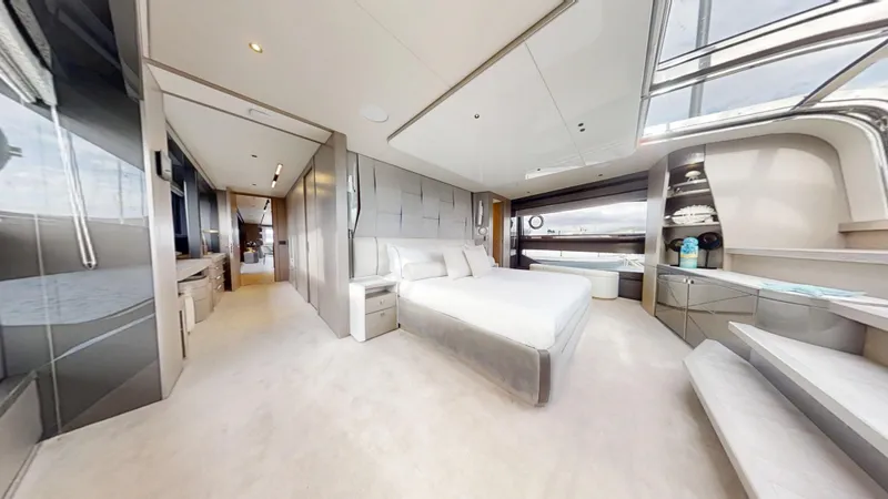 Majic Yacht Photos Pics Luxurious interior of 2023 Sunseeker 100 Yacht, featuring a spacious bedroom with modern design.