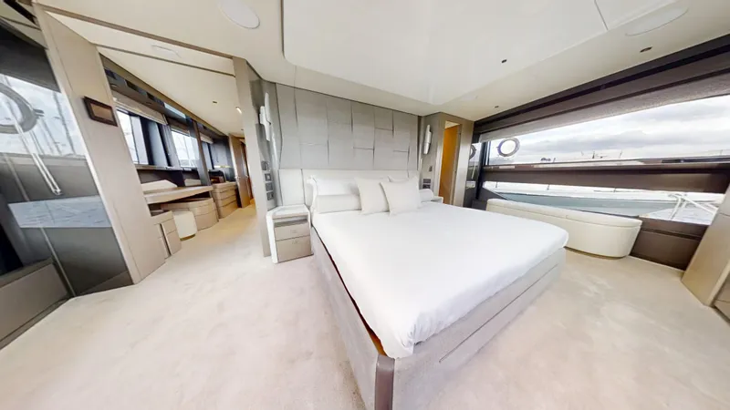 Majic Yacht Photos Pics Luxurious bedroom interior of 2023 Sunseeker 100 Yacht with modern design and large windows.