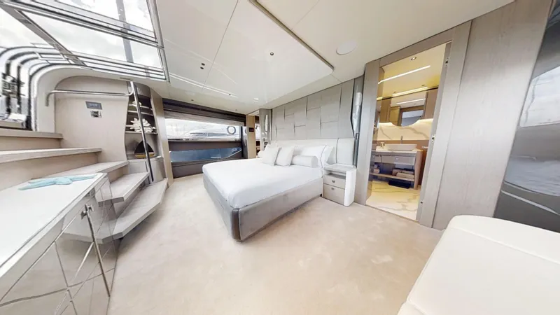 Majic Yacht Photos Pics Luxurious bedroom interior of 2023 Sunseeker 100 Yacht with modern design and elegant furnishings.