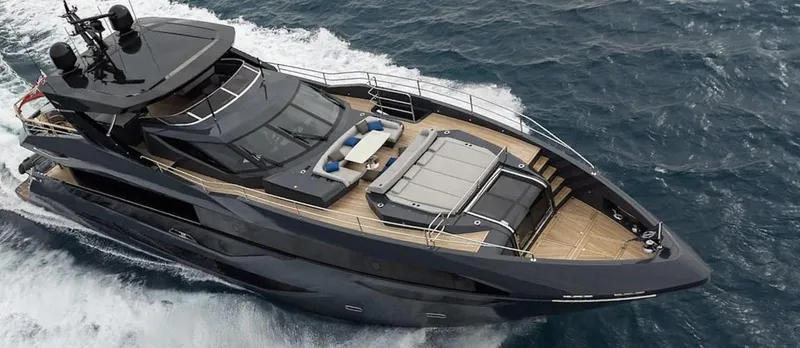 Majic Yacht Photos Pics 2023 Sunseeker 100 Yacht cruising on open water, showcasing sleek design and luxury features.