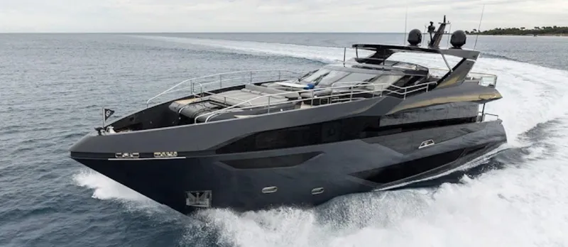 Majic Yacht Photos Pics Luxurious 2023 Sunseeker 100 Yacht cruising on open water, showcasing sleek design and elegance.