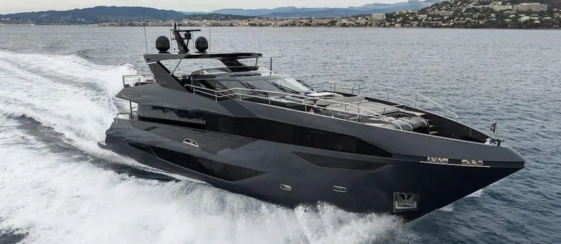 Majic Yacht Photos Pics Luxurious 2023 Sunseeker 100 Yacht cruising on open water, showcasing sleek design and elegance.