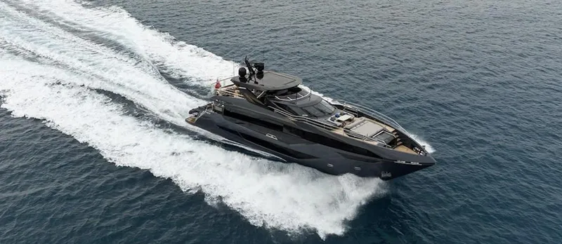 Majic Yacht Photos Pics 2023 Sunseeker 100 Yacht cruising on open sea, showcasing sleek design and luxury.