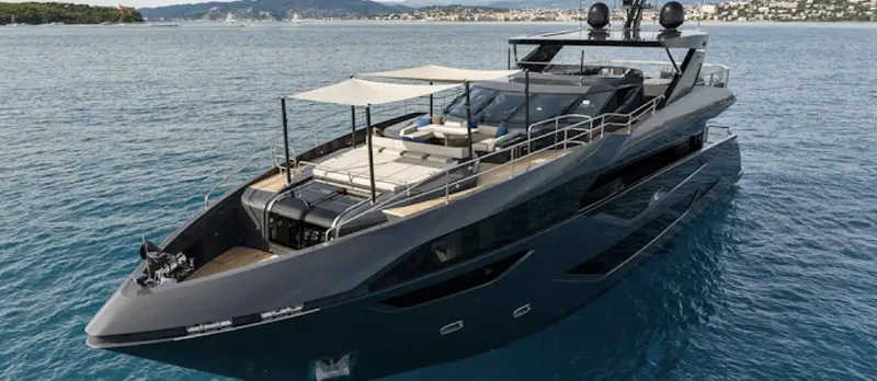 Majic Yacht Photos Pics 2023 Sunseeker 100 Yacht on serene blue waters, showcasing luxury and modern design.