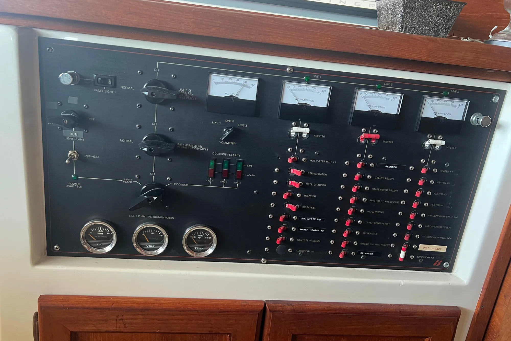 Control panel of a 1986 Bayliner 4550 Motoryacht with gauges and switches.