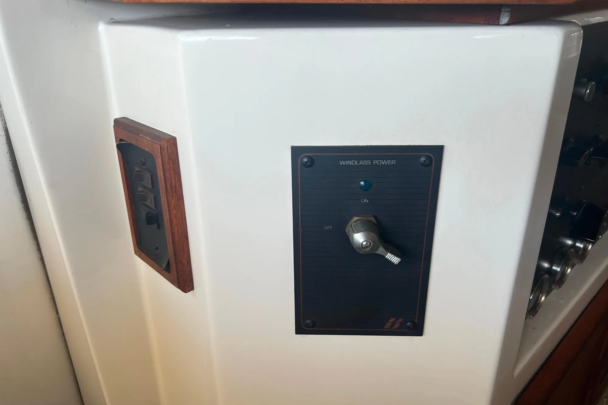 Windlass power switch on 1986 Bayliner 4550 Motoryacht control panel.