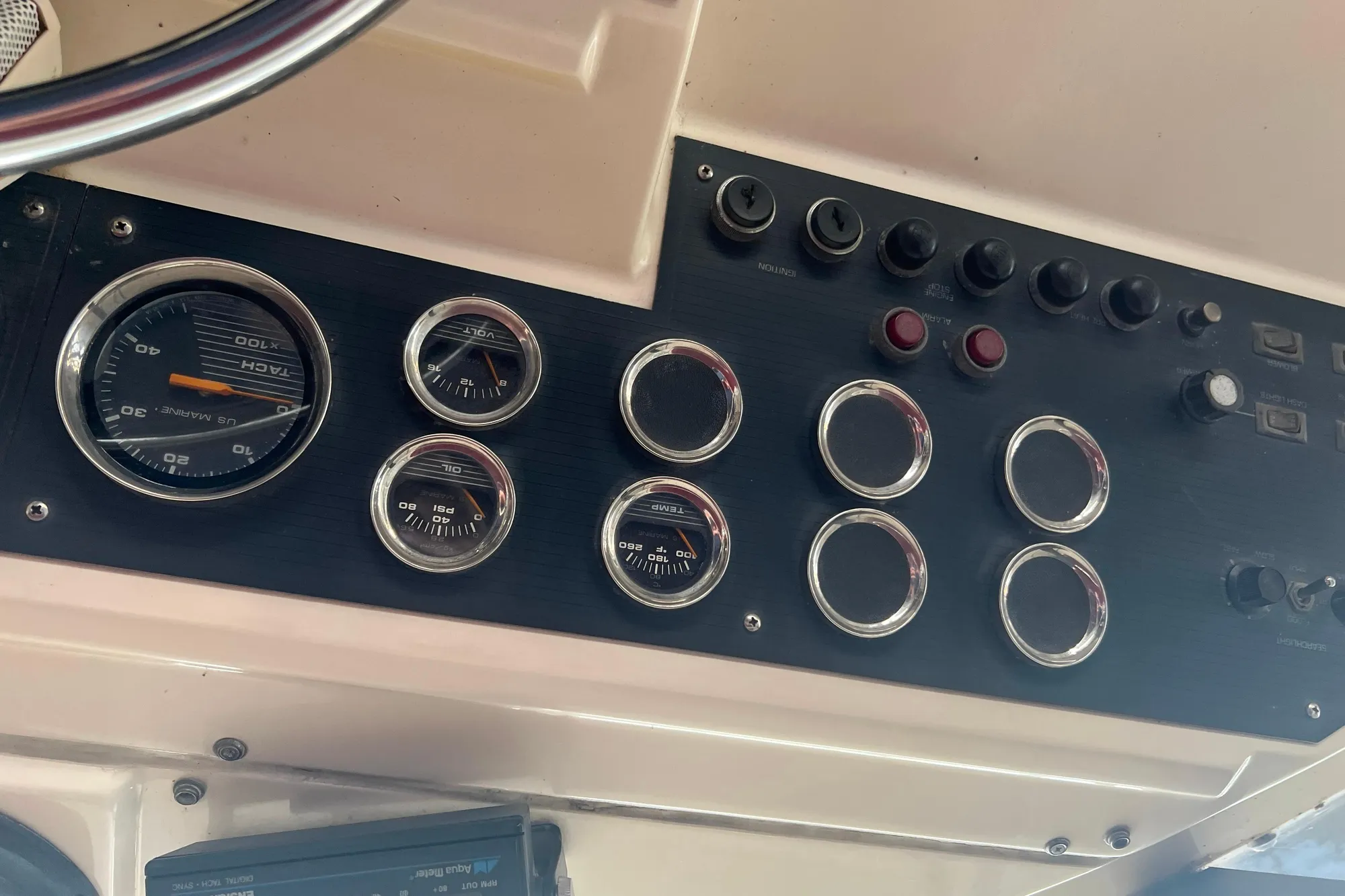 1986 Bayliner 4550 Motoryacht dashboard with gauges and controls.