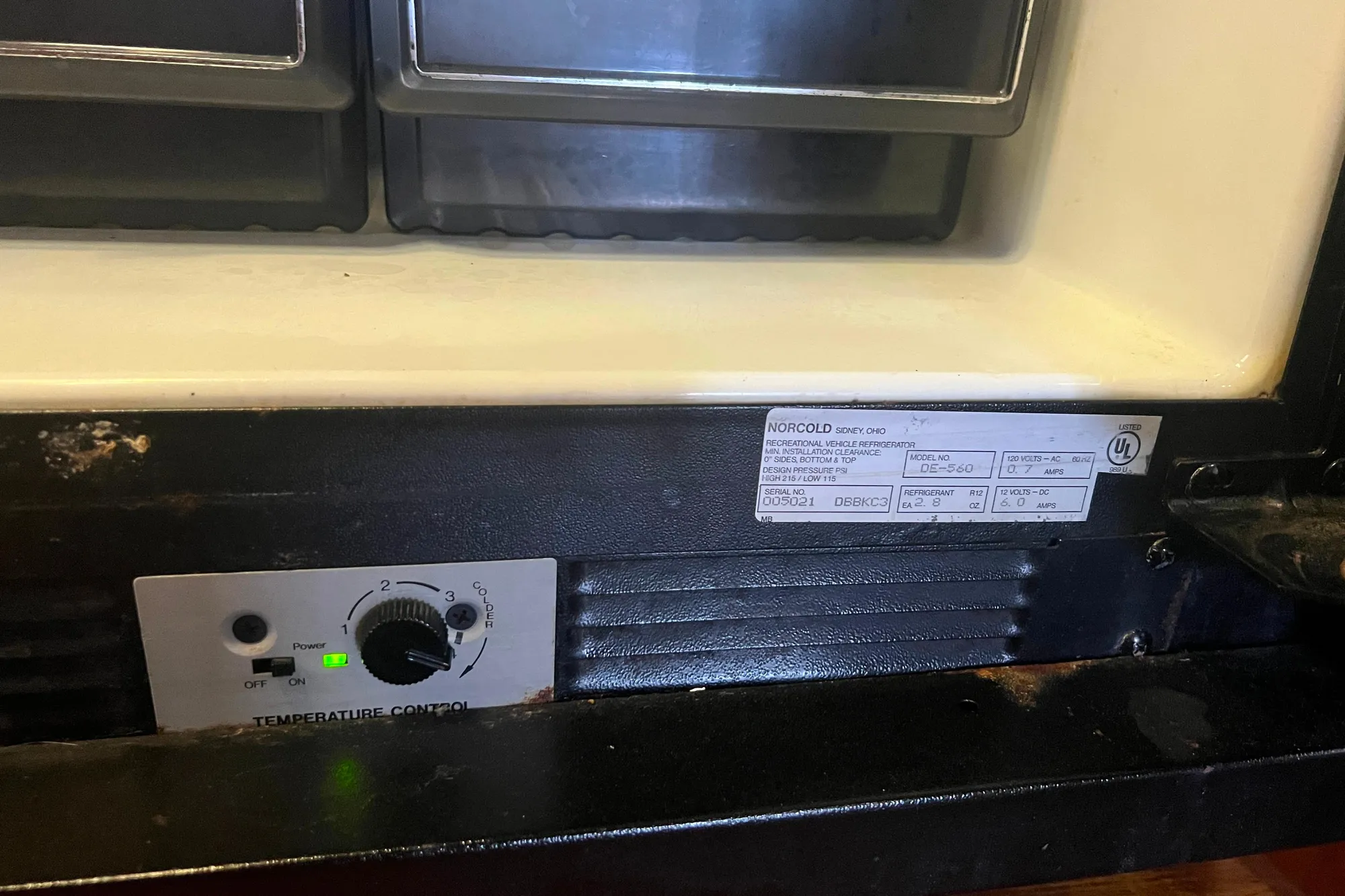 Temperature control panel of a Norcold refrigerator on a 1986 Bayliner 4550 Motoryacht.