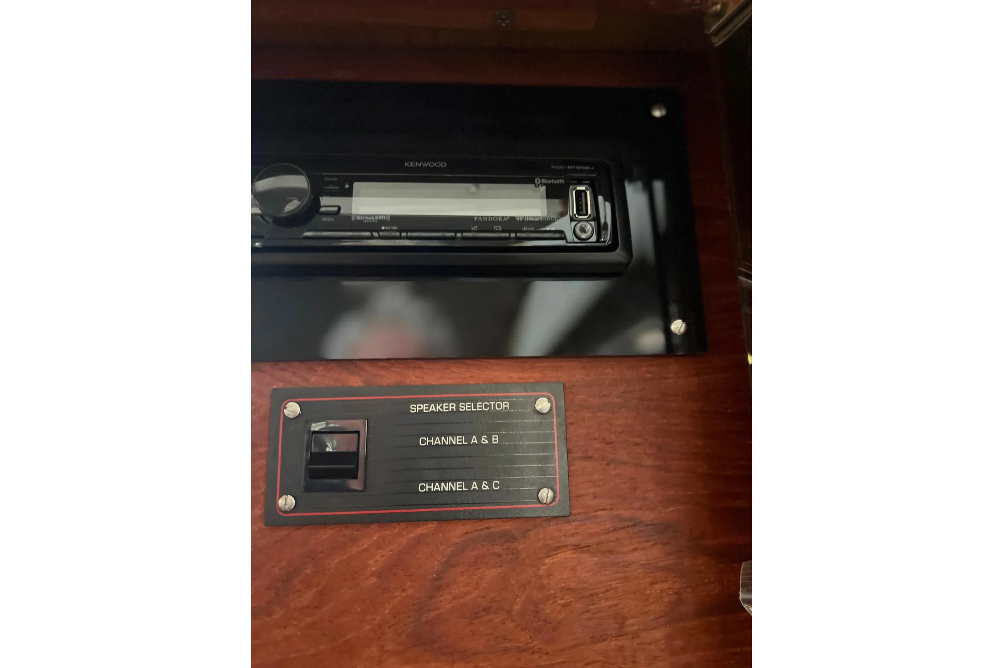 Speaker selector and Kenwood stereo on 1986 Bayliner 4550 Motoryacht.