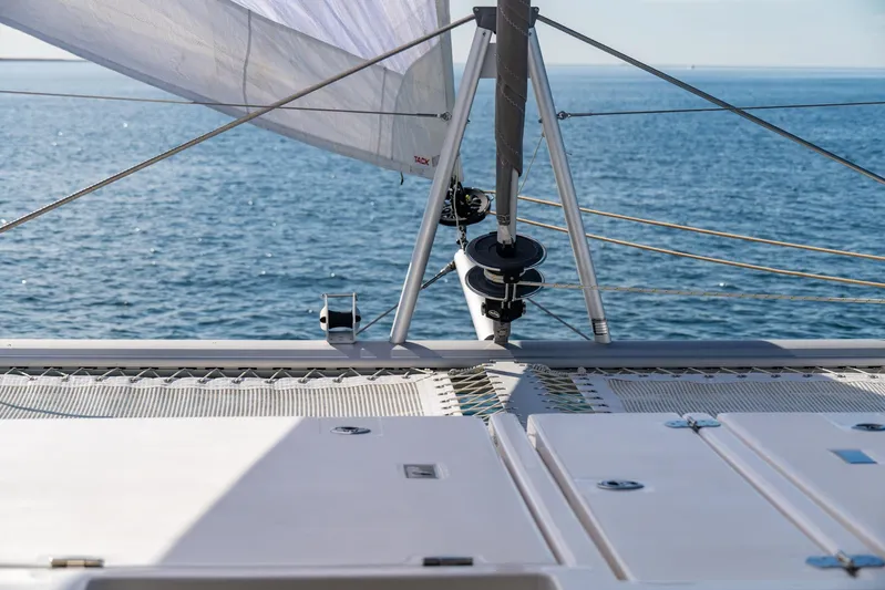  Yacht Photos Pics 2024 Leopard 50 sailboat deck with ocean view and rigging details.