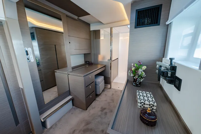  Yacht Photos Pics Luxurious 2024 Leopard 50 yacht interior with modern design, featuring a vanity and elegant decor.