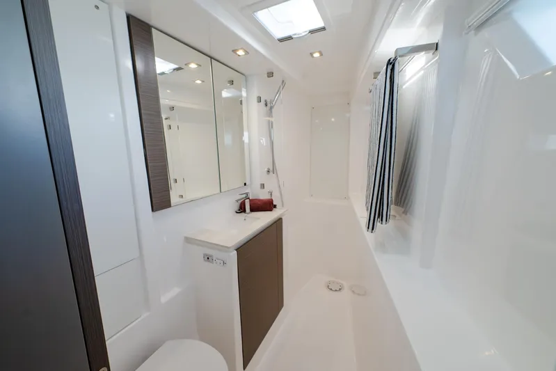  Yacht Photos Pics Modern bathroom interior on 2024 Leopard 50 yacht, featuring sleek design and elegant fixtures.
