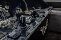 Control panel of 2006 Arno Leopard 31 OPEN yacht with throttle levers and navigation instruments.