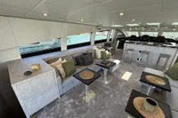 Luxurious interior of 2006 Arno Leopard 31 OPEN yacht with modern seating and decor.