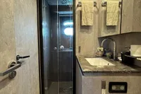 Luxurious bathroom in 2006 Arno Leopard 31 OPEN yacht with modern fixtures and shower.