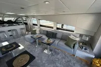 Luxurious interior of 2006 Arno Leopard 31 OPEN yacht with modern seating and decor.