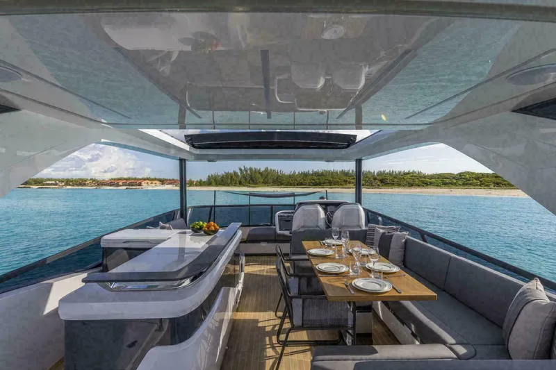 Pearl 72 Indulgence Yacht Photos Pics Luxurious Pearl 72 yacht interior with dining area, ocean view, and modern design, 2025 model.