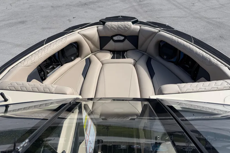  Yacht Photos Pics 2026 Centurion Ri230 boat interior with luxurious beige seating and modern design.