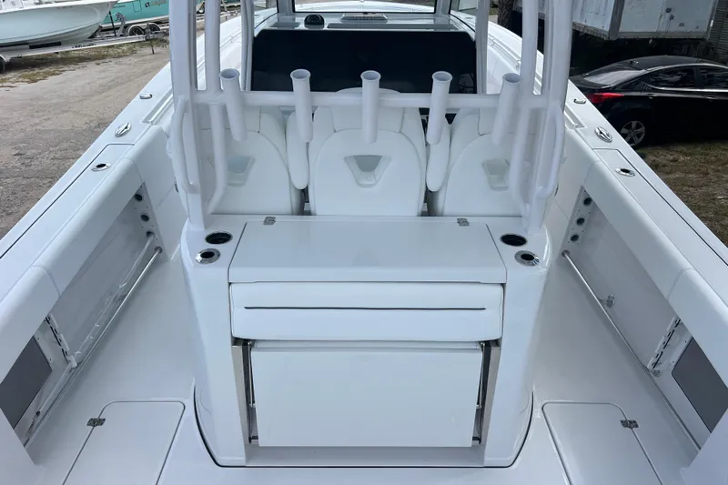  Yacht Photos Pics 2026 Sportsman Open 352 Center Console boat interior with rod holders and seating.