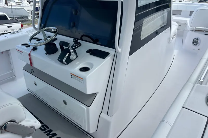  Yacht Photos Pics 2026 Sportsman Open 352 Center Console boat interior with steering wheel and controls.