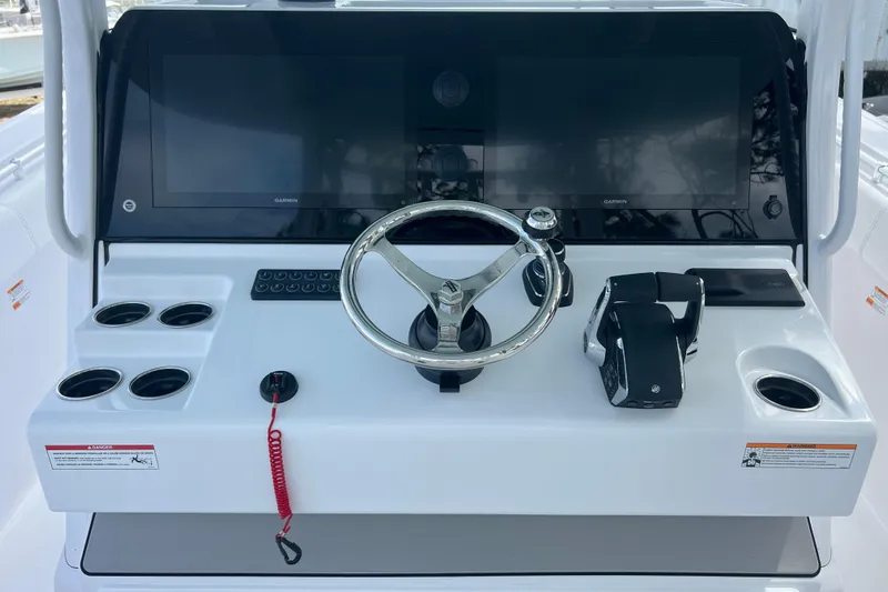  Yacht Photos Pics 2026 Sportsman Open 352 Center Console dashboard with steering wheel and controls.