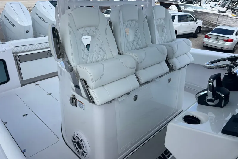  Yacht Photos Pics 2026 Sportsman Open 352 Center Console with luxurious white seating and modern controls.