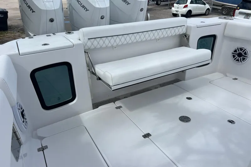  Yacht Photos Pics 2026 Sportsman Open 352 Center Console boat interior with white seating and Mercury engines.