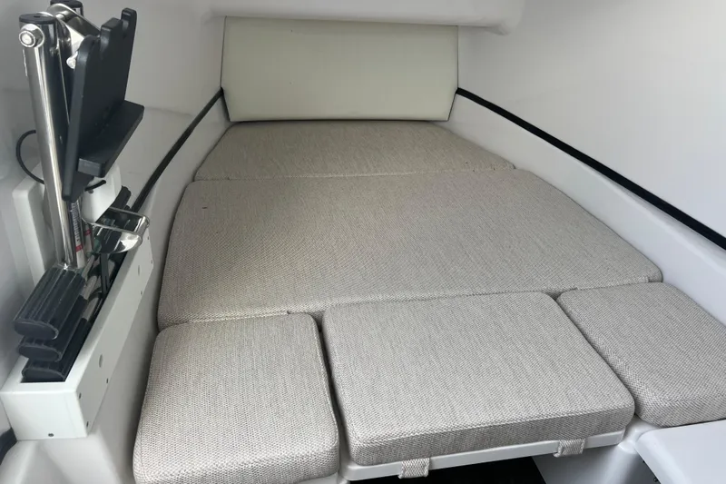  Yacht Photos Pics 2026 Sportsman Open 352 Center Console cabin with cushioned seating and modern interior design.