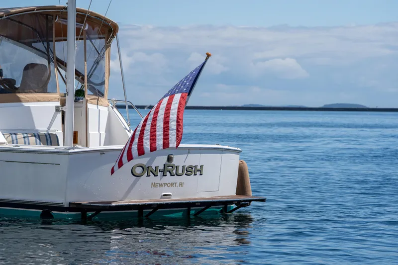 On-rush Yacht Photos Pics Grand Banks Eastbay 43 Ex 2000 yacht On-Rush in Newport, RI, with American flag.
