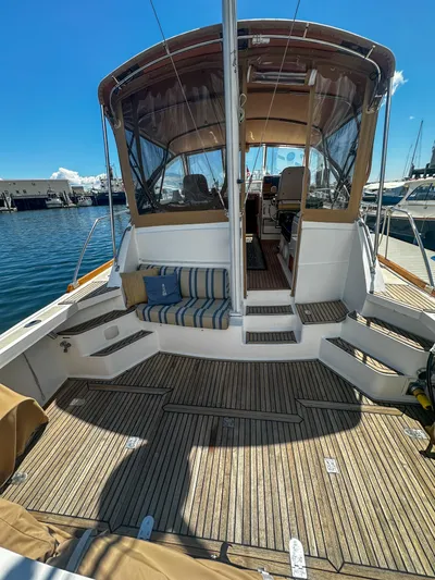 On-rush Yacht Photos Pics 2000 Grand Banks Eastbay 43 Ex yacht with spacious deck and seating area.