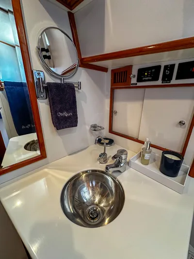 On-rush Yacht Photos Pics 2000 Grand Banks Eastbay 43 Ex bathroom sink and vanity area