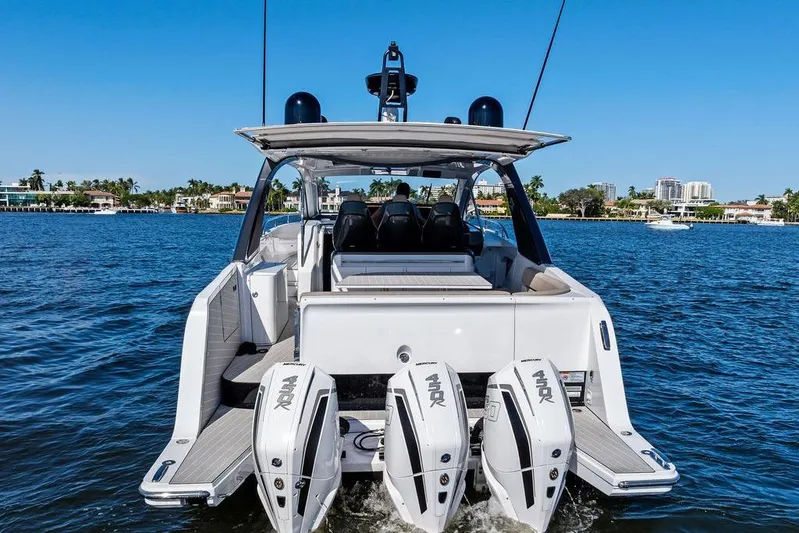  Yacht Photos Pics 2024 Azimut Verve 42 yacht with triple outboard engines on a sunny day.