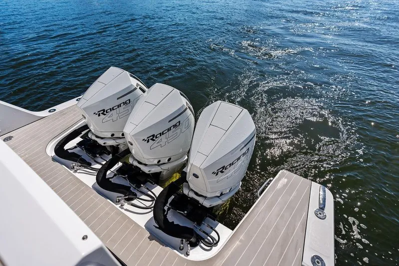  Yacht Photos Pics Triple outboard engines on 2024 Azimut Verve 42 yacht, cruising on open water.