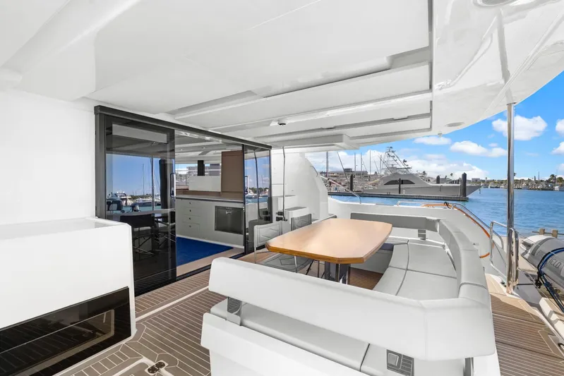 Prelude Yacht Photos Pics 2024 Leopard 46 Powercat yacht with spacious deck and modern interior at marina.